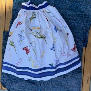 Girl Skirt by MonnaLisa, brand new, size 10 years, white with flowers